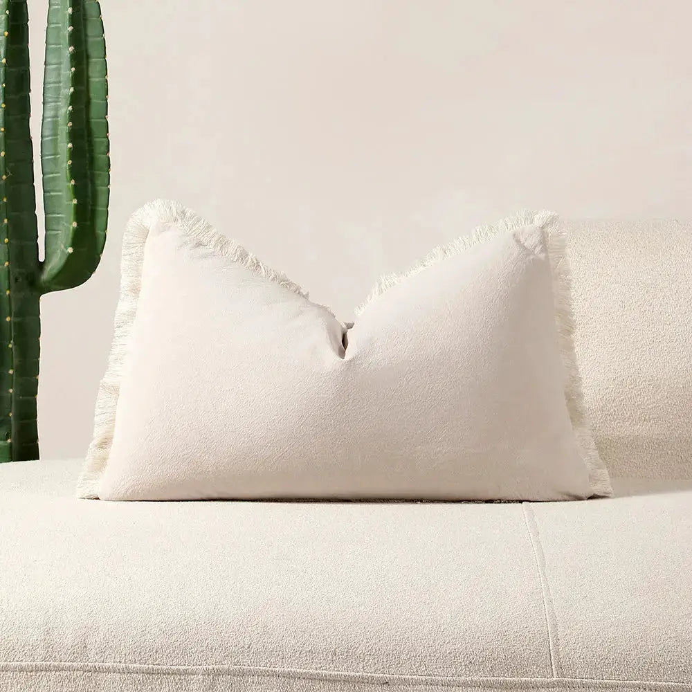 Simples Market boho throw pillow cover with tassel fringe, cream cushion on sofa