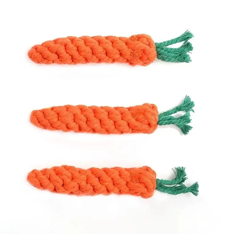 Three orange carrot-shaped cotton rope dog and cat toys with green frayed ends