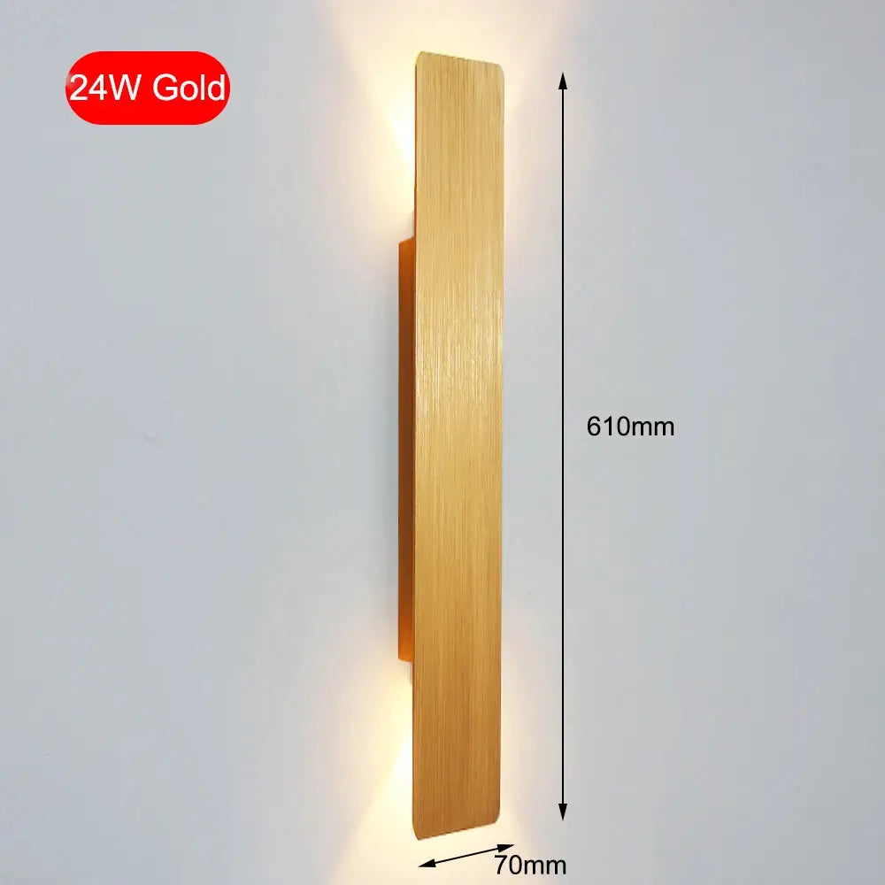 Modern LED indoor wall lamp by Simples Market in gold aluminum, 610mm tall by 70mm wide with up/down lighting.
