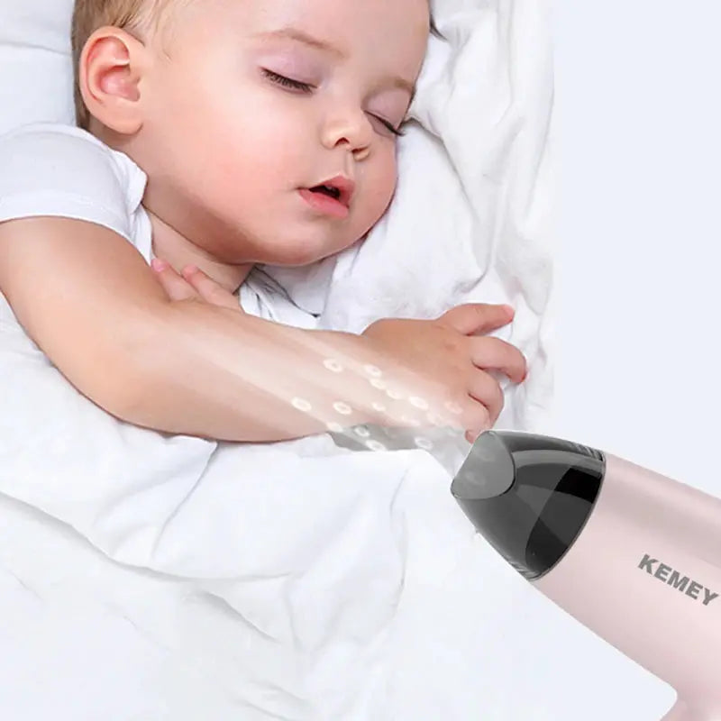 Kemei portable pink hair dryer, compact foldable design, Simples Market