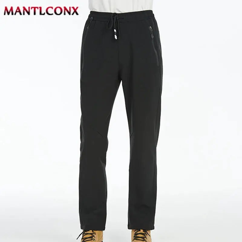Breathable men's black jogger pants with elastic waist and drawstring, zip pockets and Mantlconx logo