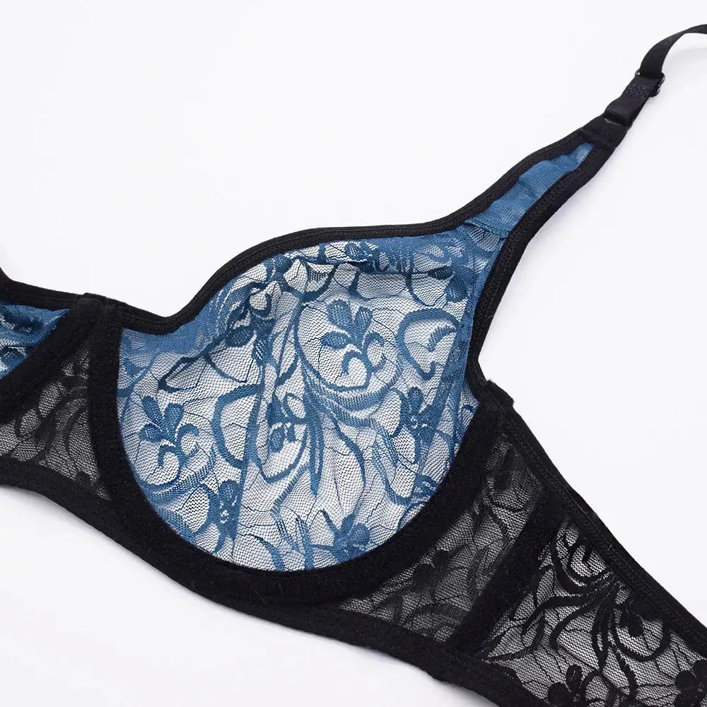 Womens plus size lace underwire bra with blue floral embroidery and black sheer mesh cups.