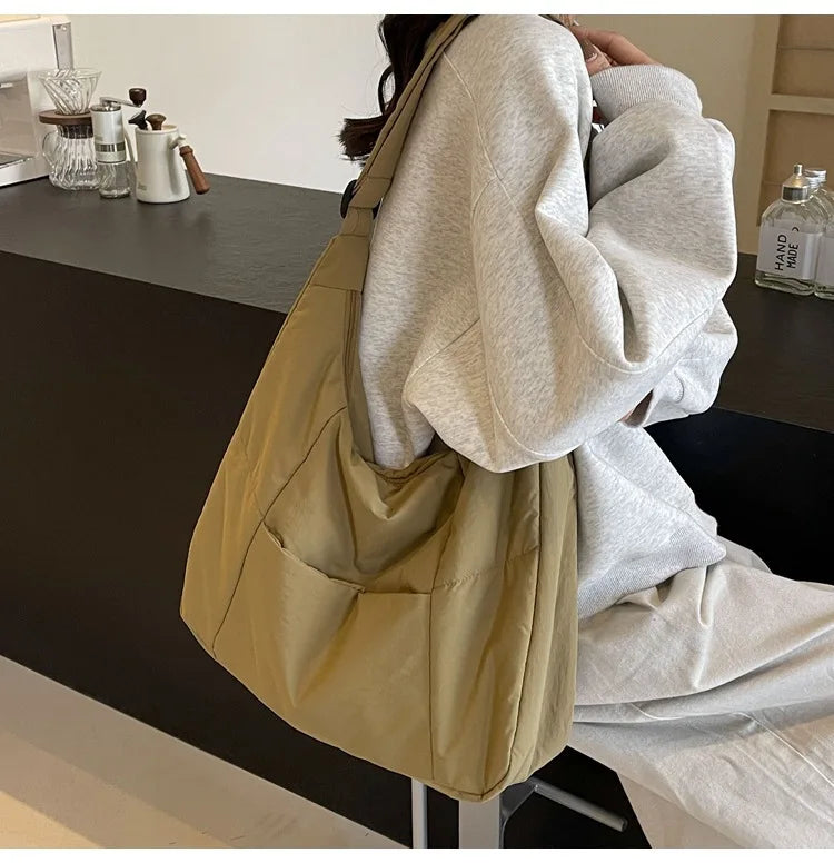Trendy women's soft-cloth shoulder bag in tan khaki, large crossbody tote.