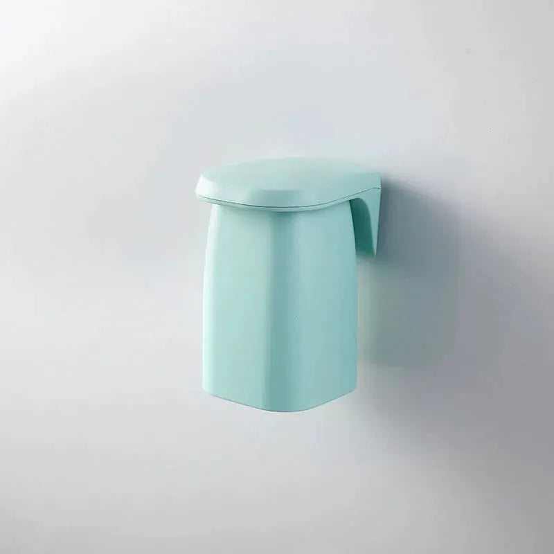 Mint green magnetic mouthwash cup, wall-mounted with lid