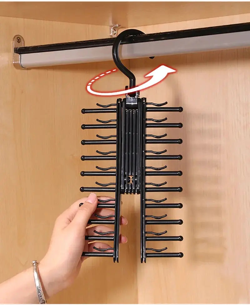 Simples Market black rotating 360° tie storage rack with multiple arms for ties, belts, scarves.