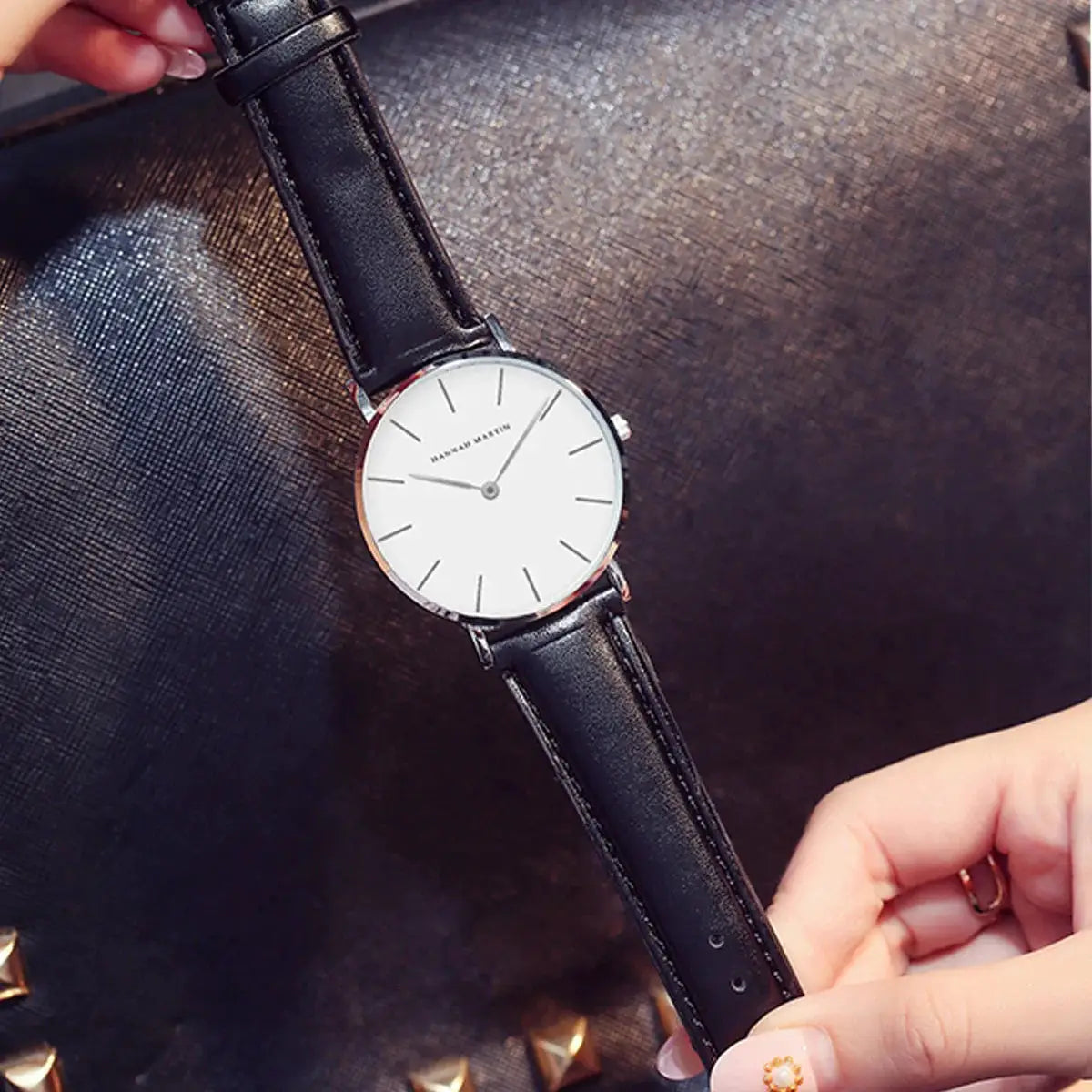 Hannah Martin wristwatch with white dial, rose-gold case and black leather strap