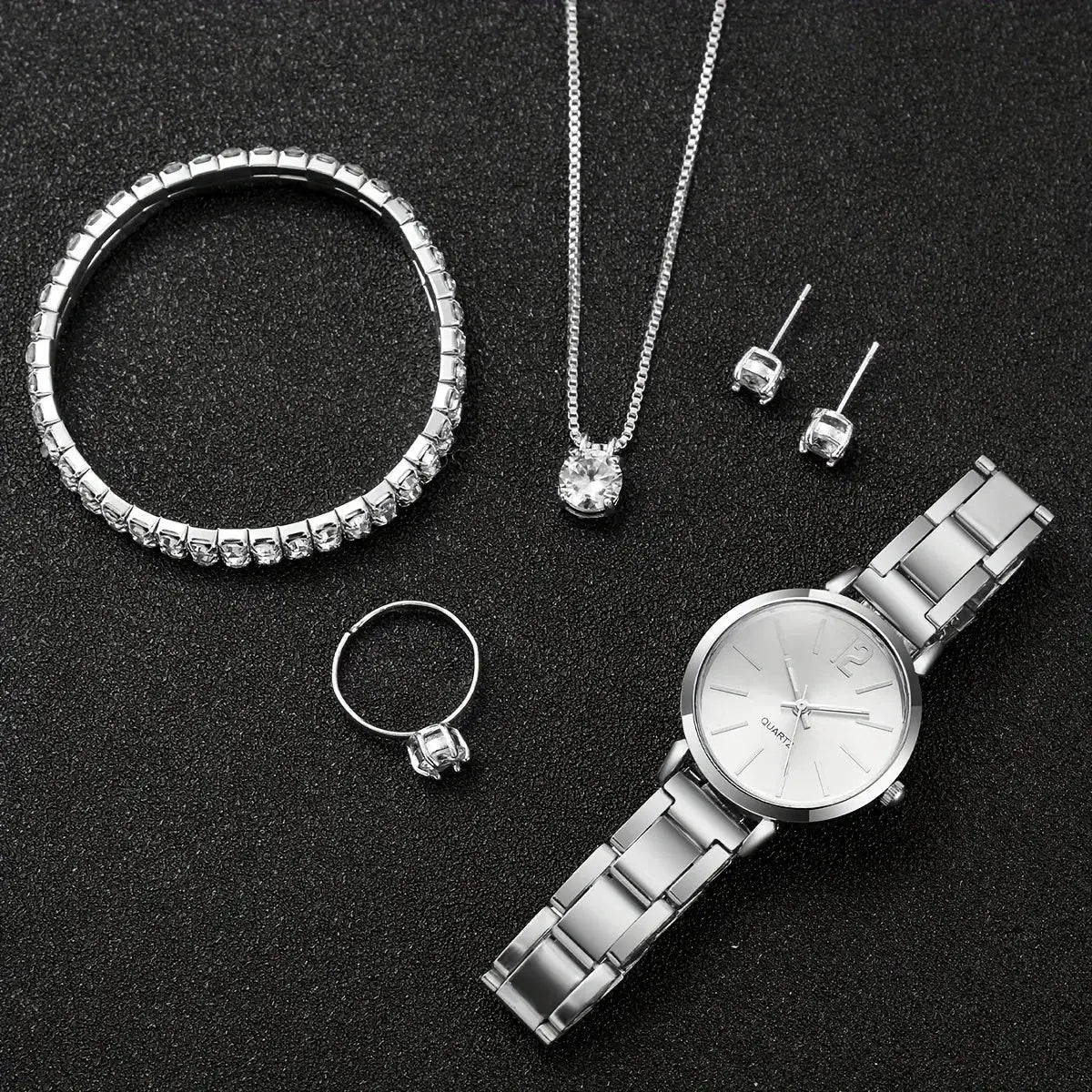 6-piece women's jewelry set with a silver stainless steel quartz watch, bracelet, pendant necklace, ring, and stud earrings