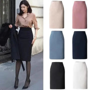 Simples Market high-waisted office pencil skirt in 6 color options; model wearing black.