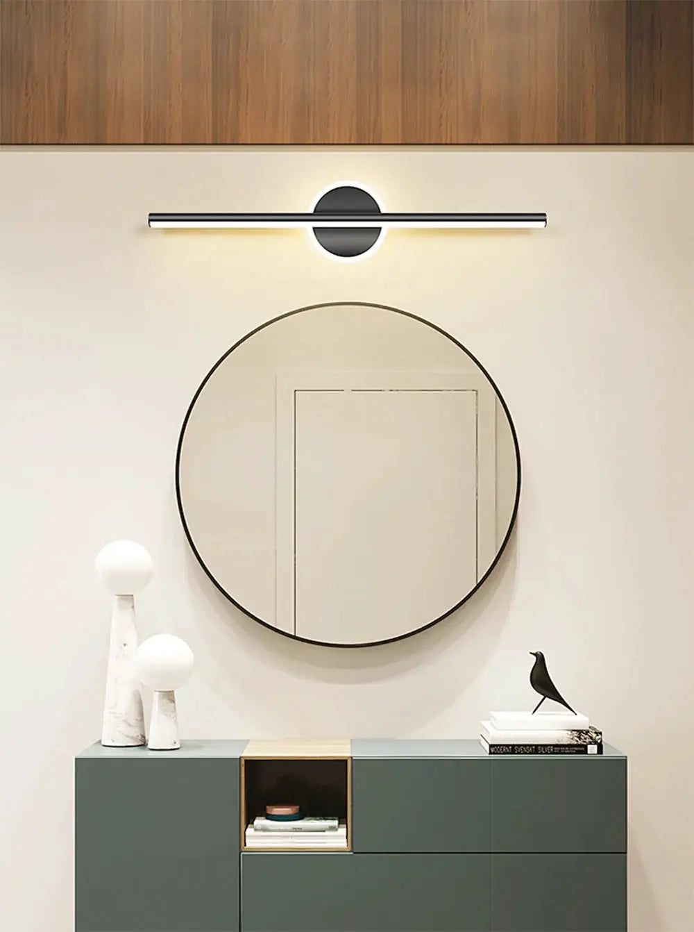 Modern LED wall lamp black and gold long strip fixture above a circular bathroom mirror