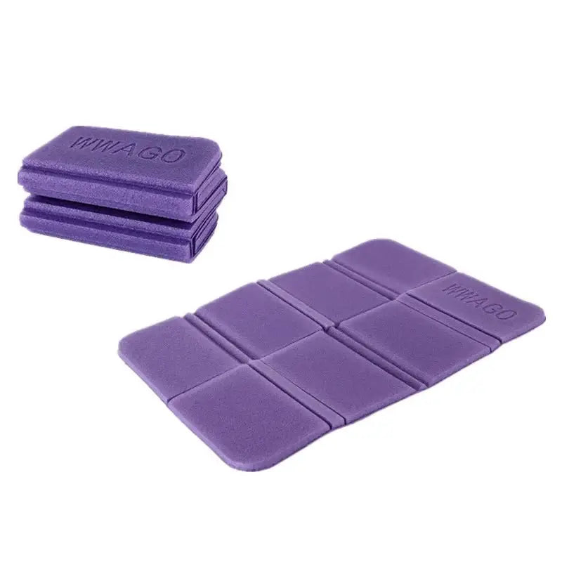 Foldable XPE foam mat in purple; moistureproof picnic and camping seat cushion, shown unfolded and stacked.