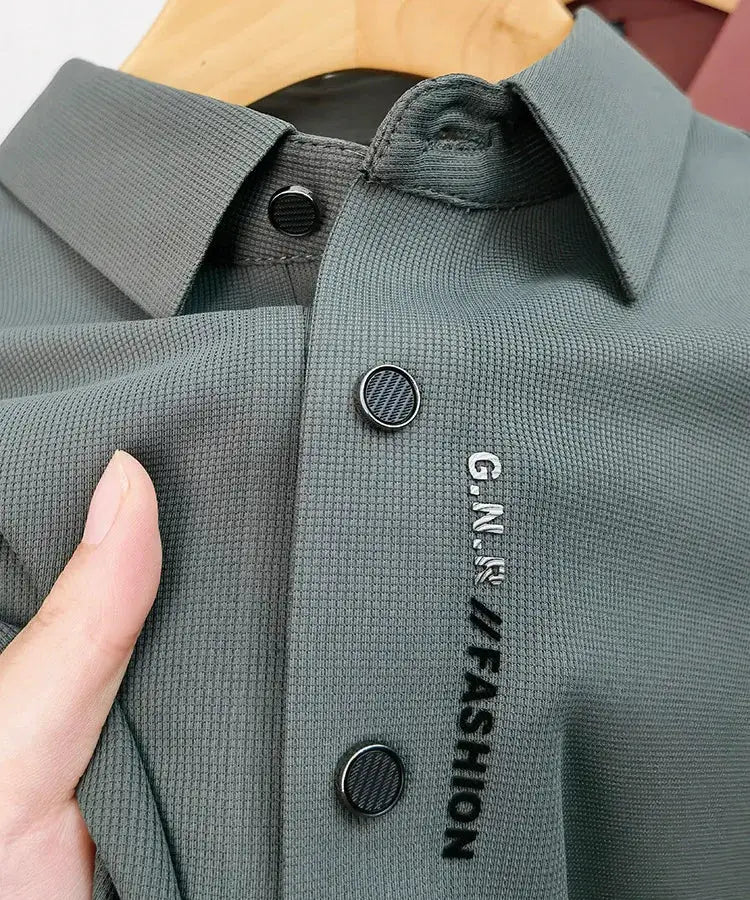 Simples Market ice silk polo shirt, gray-green short-sleeve with textured weave and button placket.