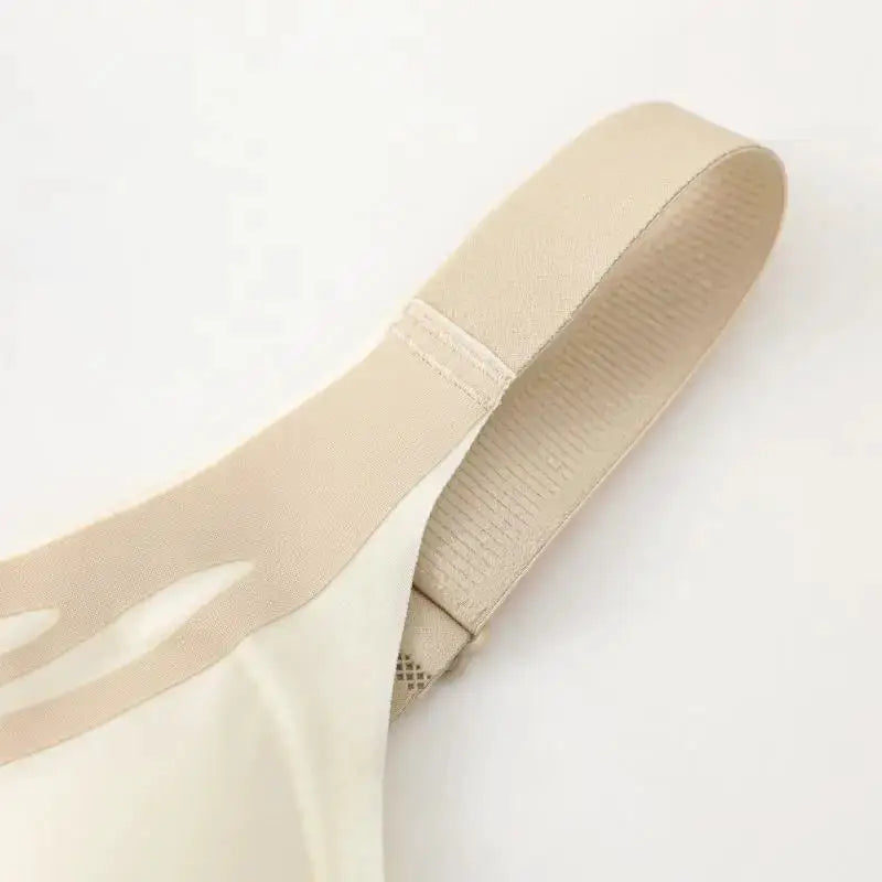 Bra strap close-up in beige; seamless, wireless, soft breathable fabric by Simples Market