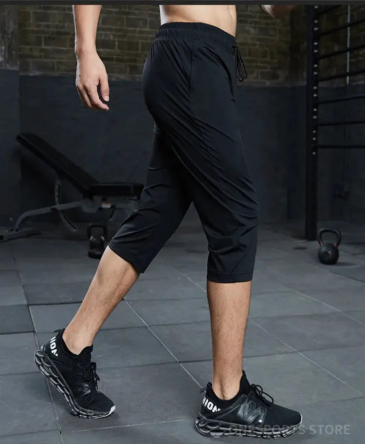 SONECHOKI men's black calf-length running pants with loose fit and quick-dry fabric, Simples Market