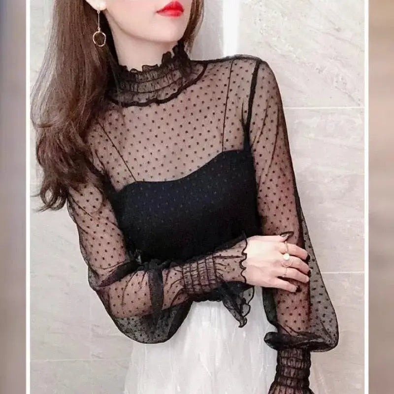 Women's black sheer mesh blouse with polka-dot pattern, high ruffled neck and long sleeves by Simples Market