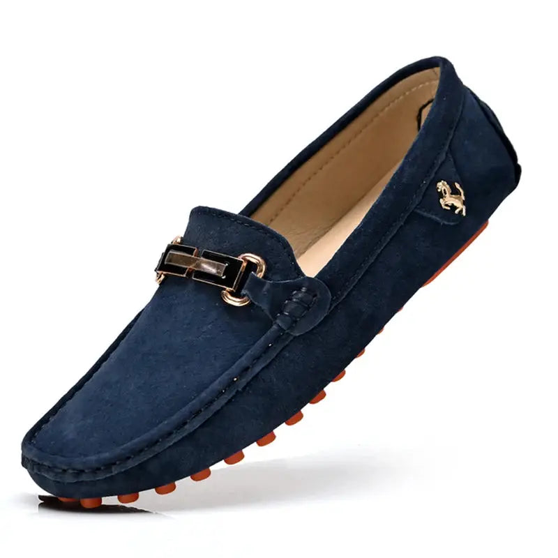 YRZL men's navy suede loafers by Simples Market with gold horse emblem, metal buckle, orange studded driving sole