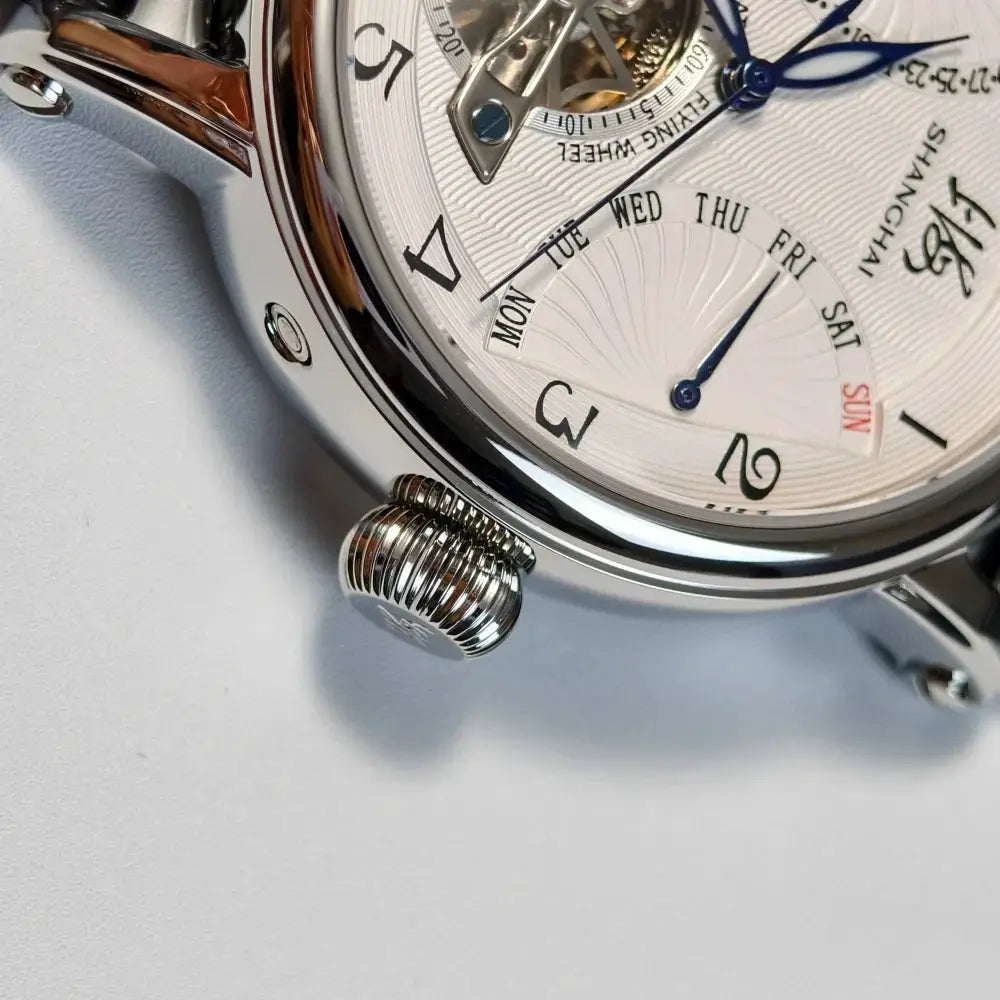 Shanghai Watch 42mm automatic mechanical wristwatch with stainless steel case, blue hands, calendar dial, brown leather strap