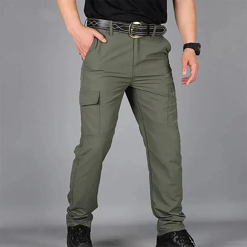 Men's olive green quick-dry cargo pants with multiple pockets for outdoor use