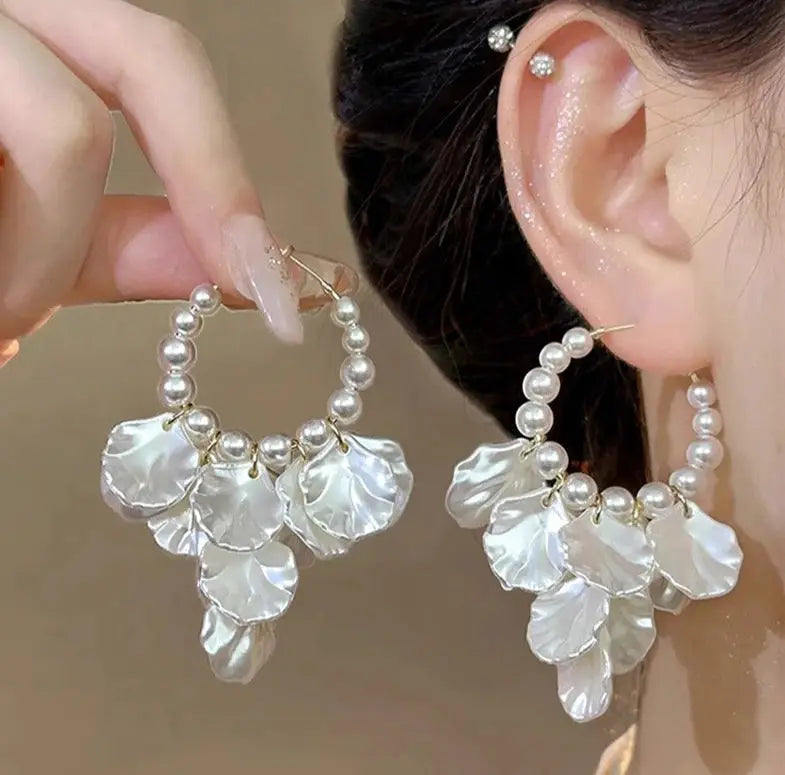 Pearl bead hoop earrings with dangling glossy white shell flower petals, women’s fashion jewelry for formal occasions