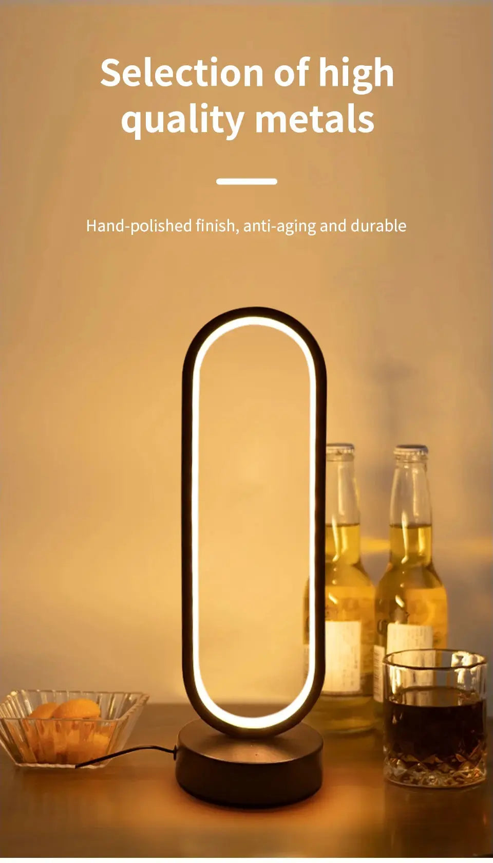 Simples Market ring night lamp with three-color dimmable LED, warm ambient glow on a black base atop a bedside table