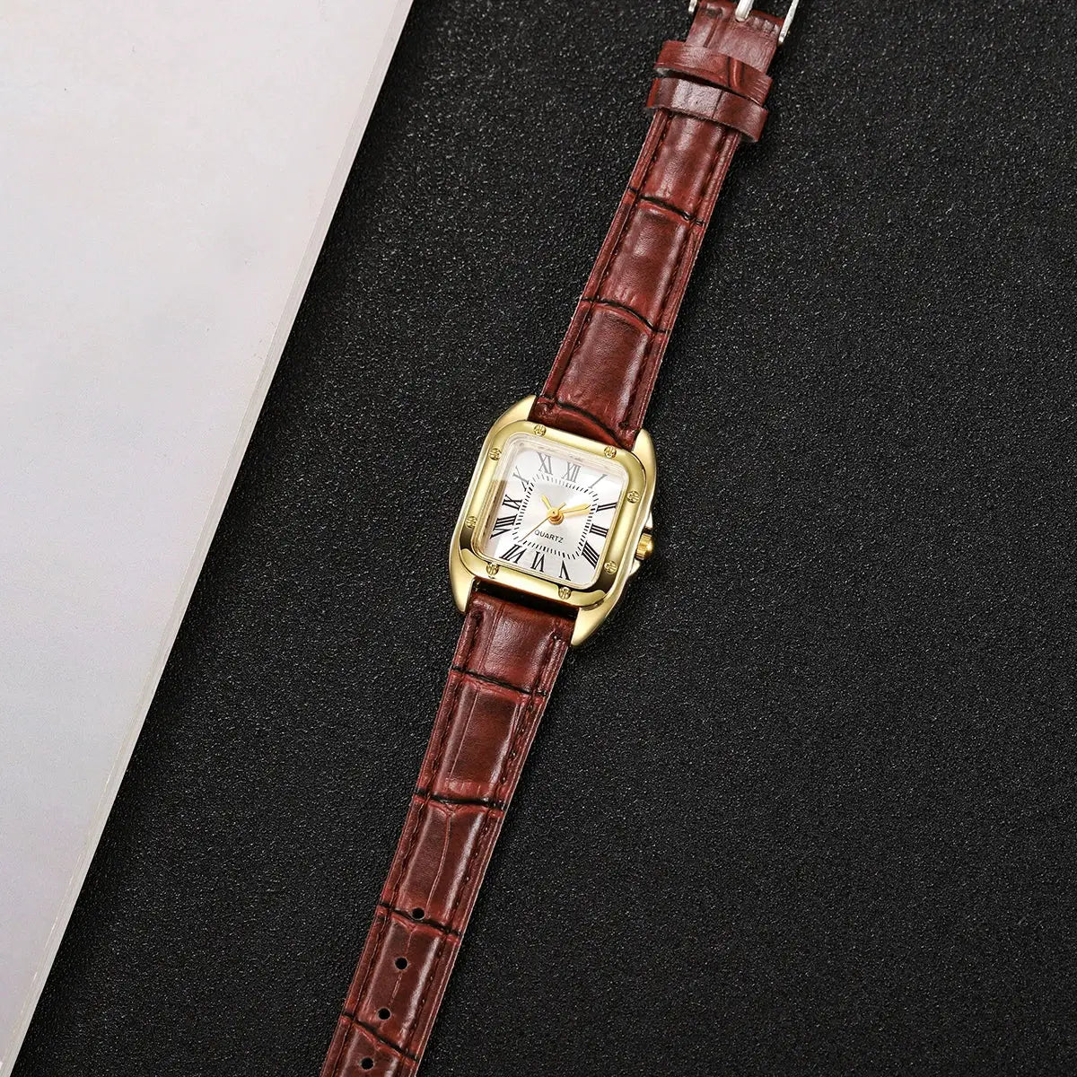 Women's square watch with brown croc-embossed leather strap, gold-tone case, white Roman numeral dial, quartz