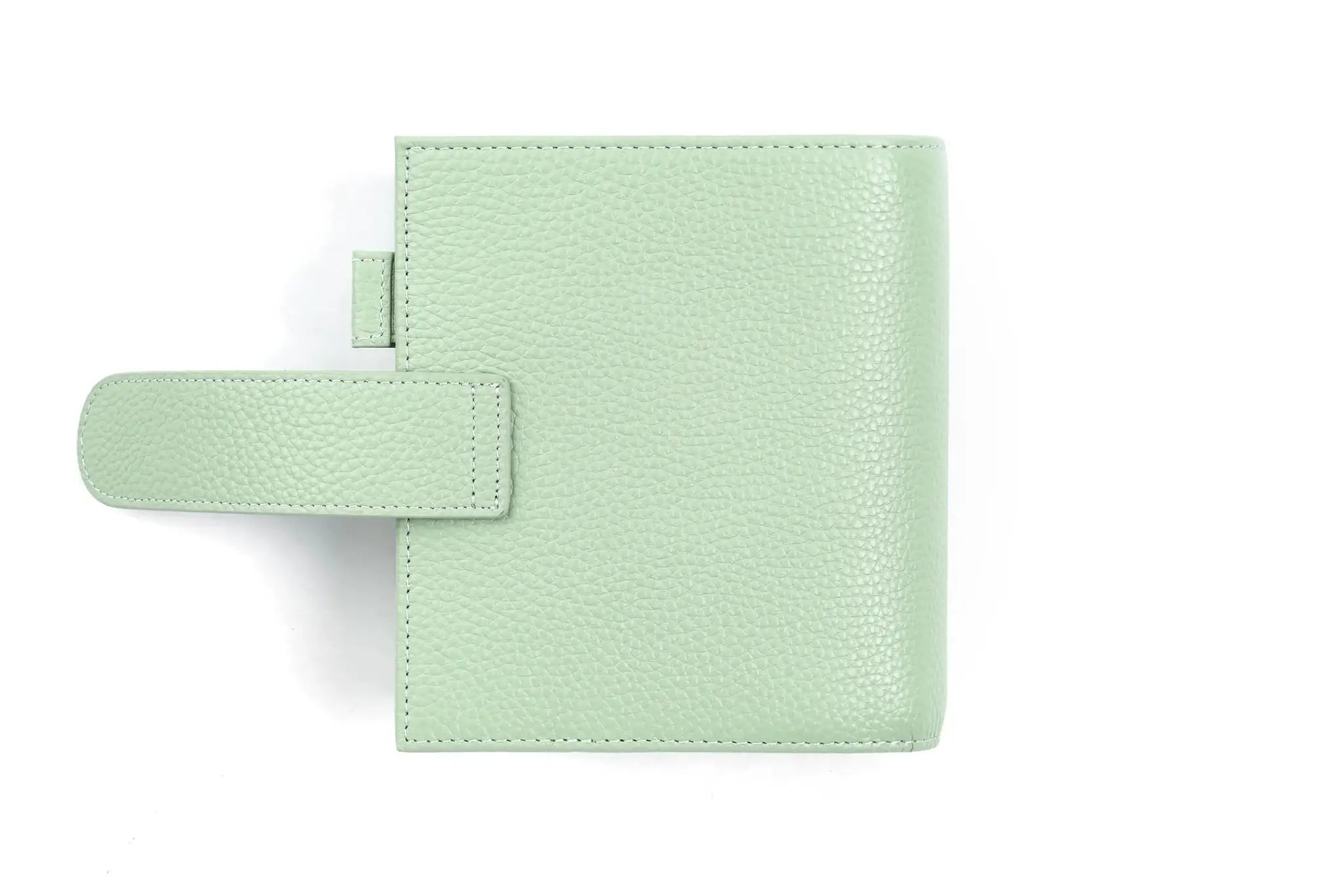 Moterm Luxe 2.0 pocket-size planner in mint pebbled leather with strap closure