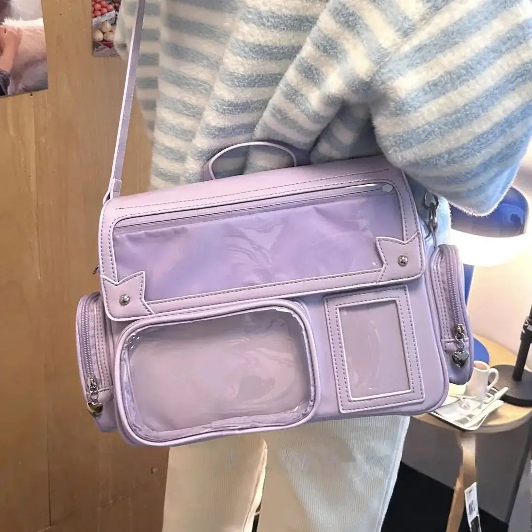 Lavender square leather backpack with clear vinyl pockets, top handle and crossbody strap