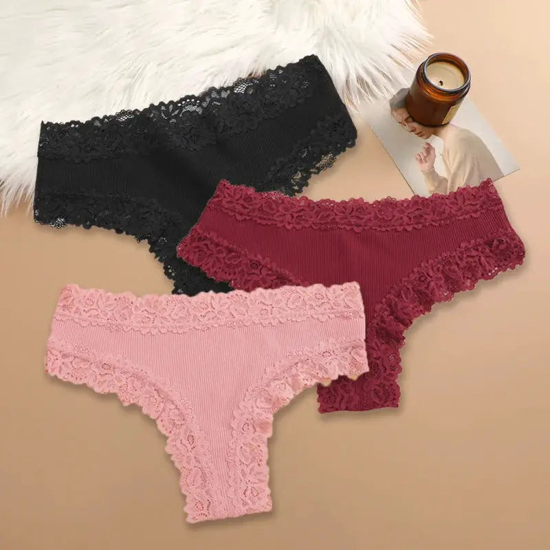 3-piece set of women's cotton panties with floral lace trim in black, burgundy, and pink by Simples Market.