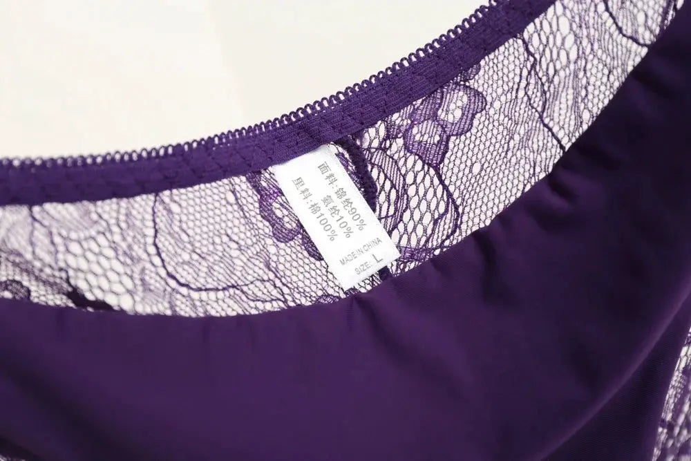 Purple lace panties with satin trim; size L tag visible inside waistband