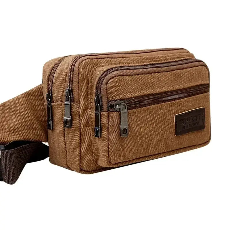 Brown canvas waist bag with multiple zippered compartments and adjustable strap