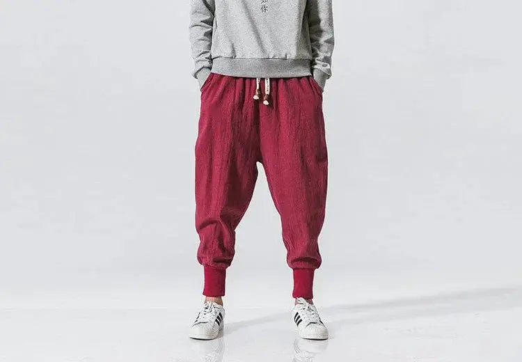 Cotton linen harem pants for men, burgundy baggy drop-crotch joggers with cuffs by Simples Market