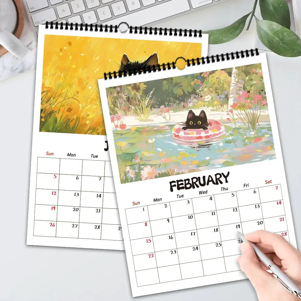 Cat wall calendar with two black cat designs and monthly grids
