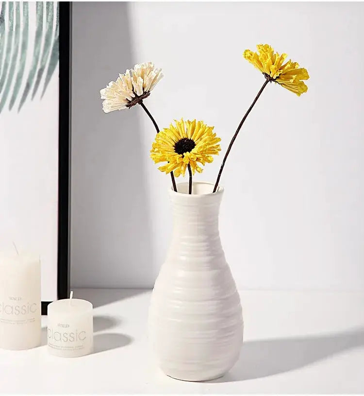 Nordic plastic vase, small white ribbed vase with yellow and cream dried flowers, Simples Market.