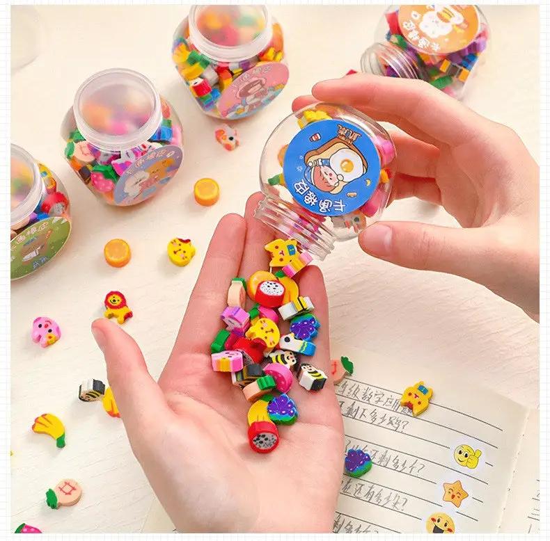 Kawaii animal and fruit pencil erasers in jars; colorful mini pieces for kids