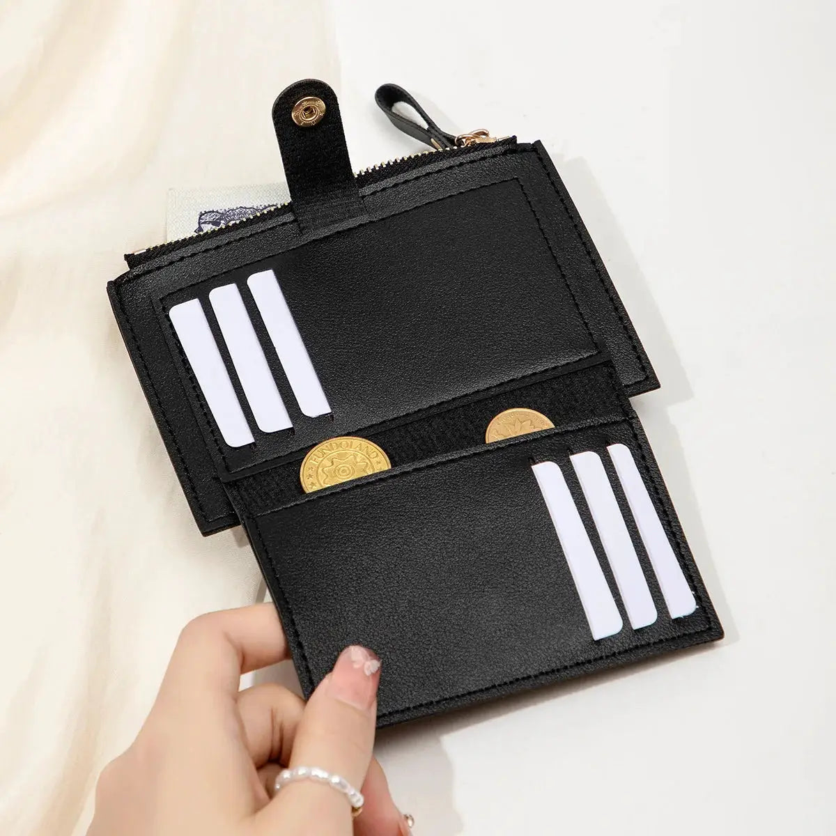 Minimalist black PU leather card wallet by Simples Market with card slots and coin pocket