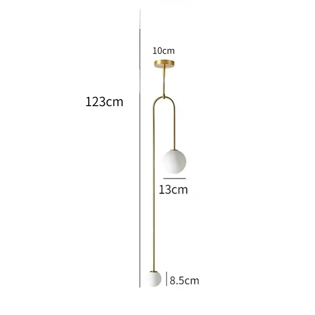 Modern brass-finish glass ball pendant light with white globe and 123 cm drop