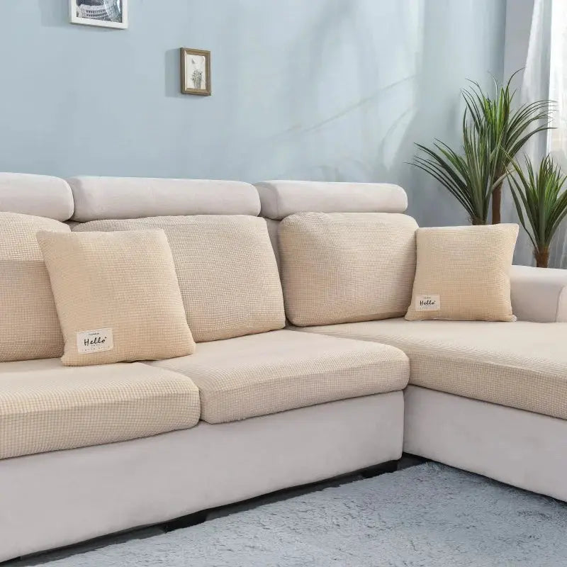 Thicken elastic beige solid color sofa cover for living room by Simples Market on a sectional couch