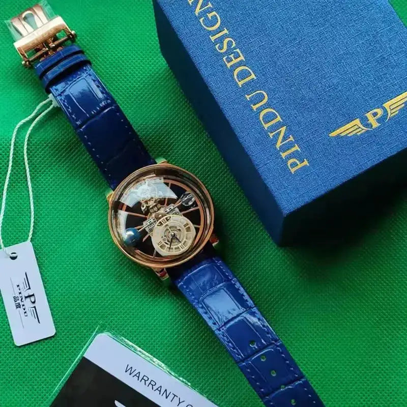 PINDU Design men's wristwatch with blue leather strap and rose-gold skeleton dial