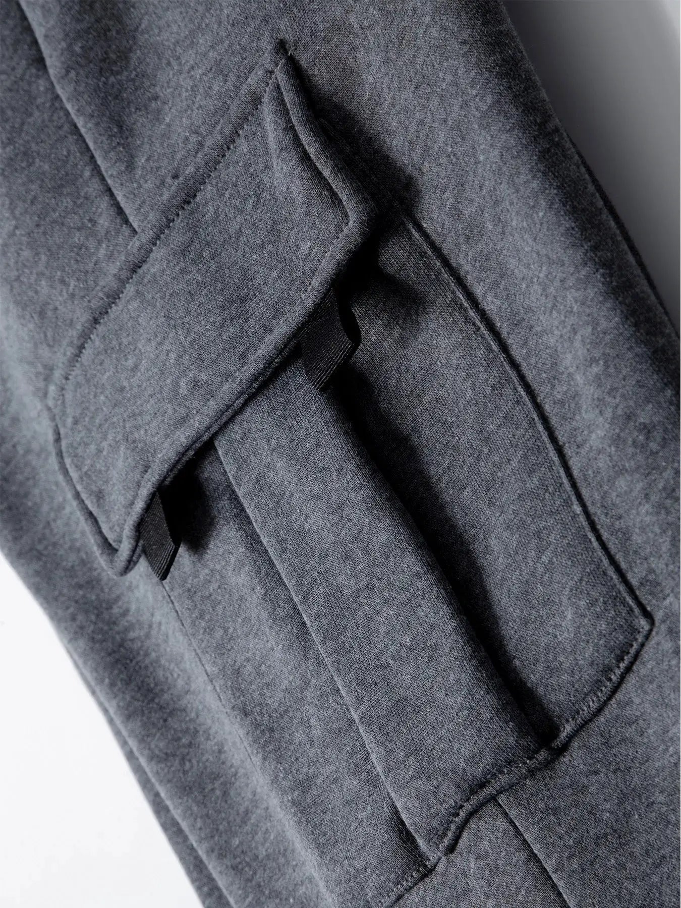 Men's cargo jogger pants in charcoal gray with drawstring waist and multiple pockets from Simples Market