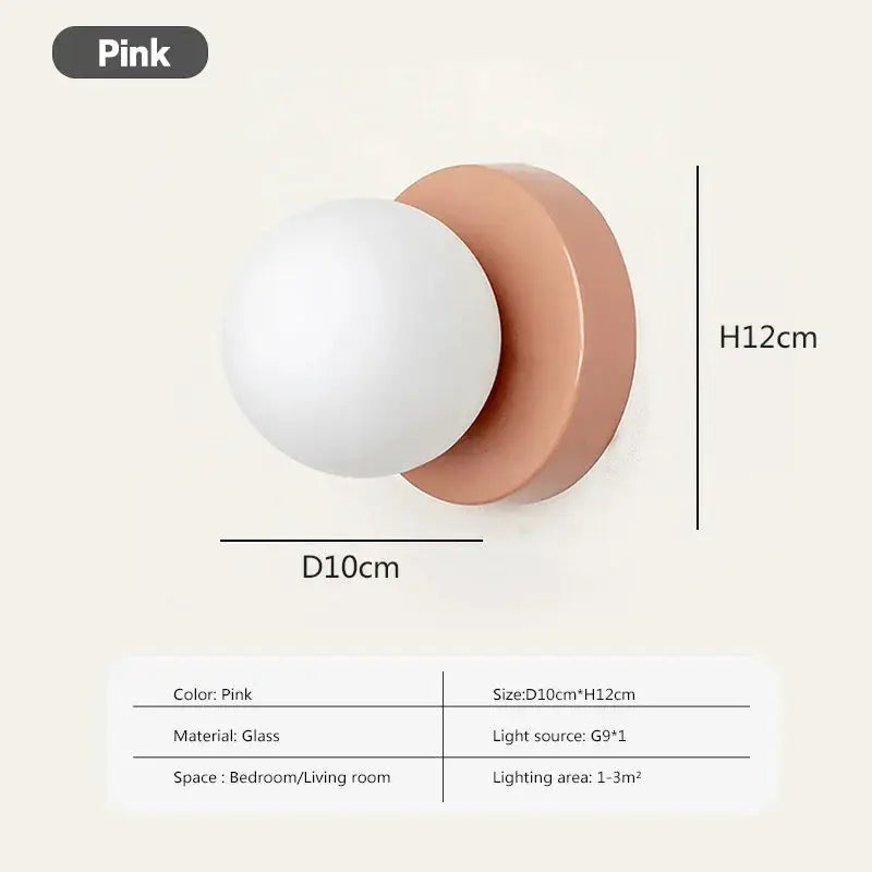 Simples Market Nordic Macaron pink LED wall lamp with glass globe, 10cm diameter and 12cm height.