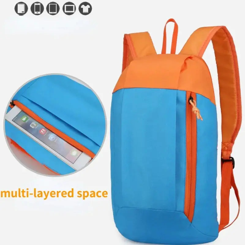 Outdoor lightweight small sports men's backpack by Simples Market, blue body with orange top and zippers.