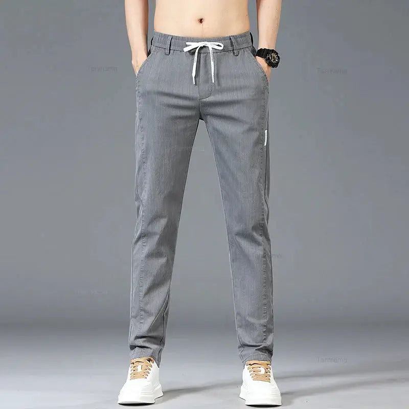 Men's casual pants by Simples Market; blue-gray slim straight trousers with elastic drawstring waist.
