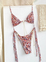 Sexy triangle bikini set with paisley print and gold chain accents.