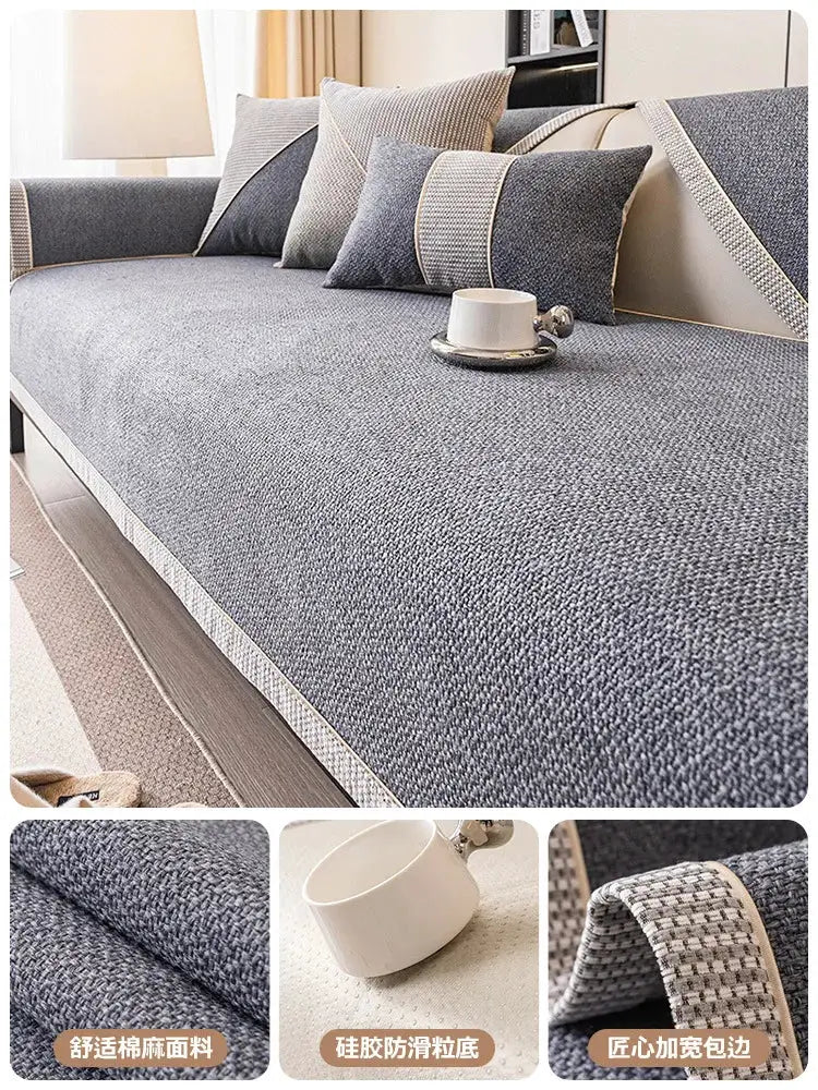 Linen blue-gray woven sofa cover with non-slip edge on a sofa with decorative cushions