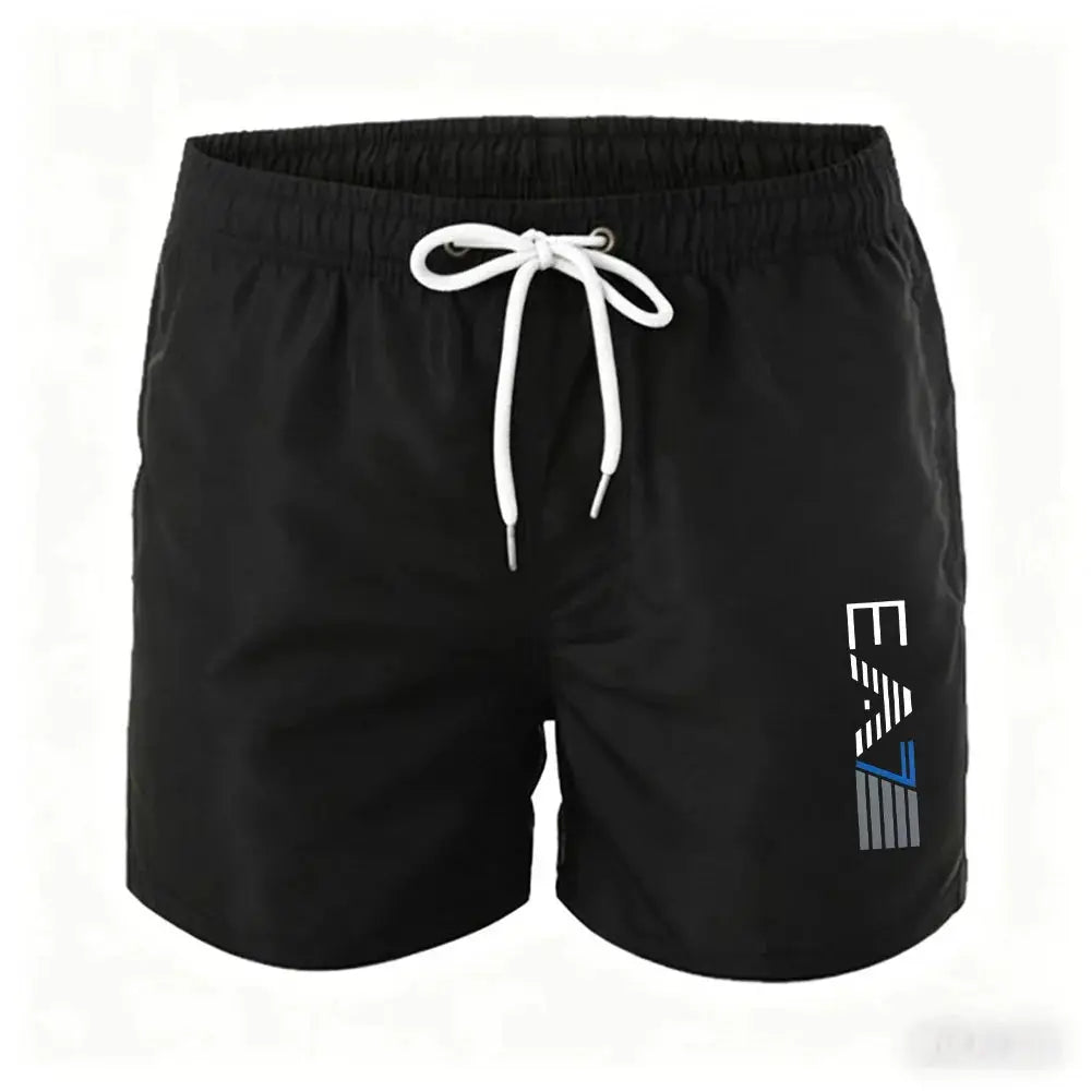 Men's black swim trunks with white drawstring, elastic waist and mesh lining; right-leg logo