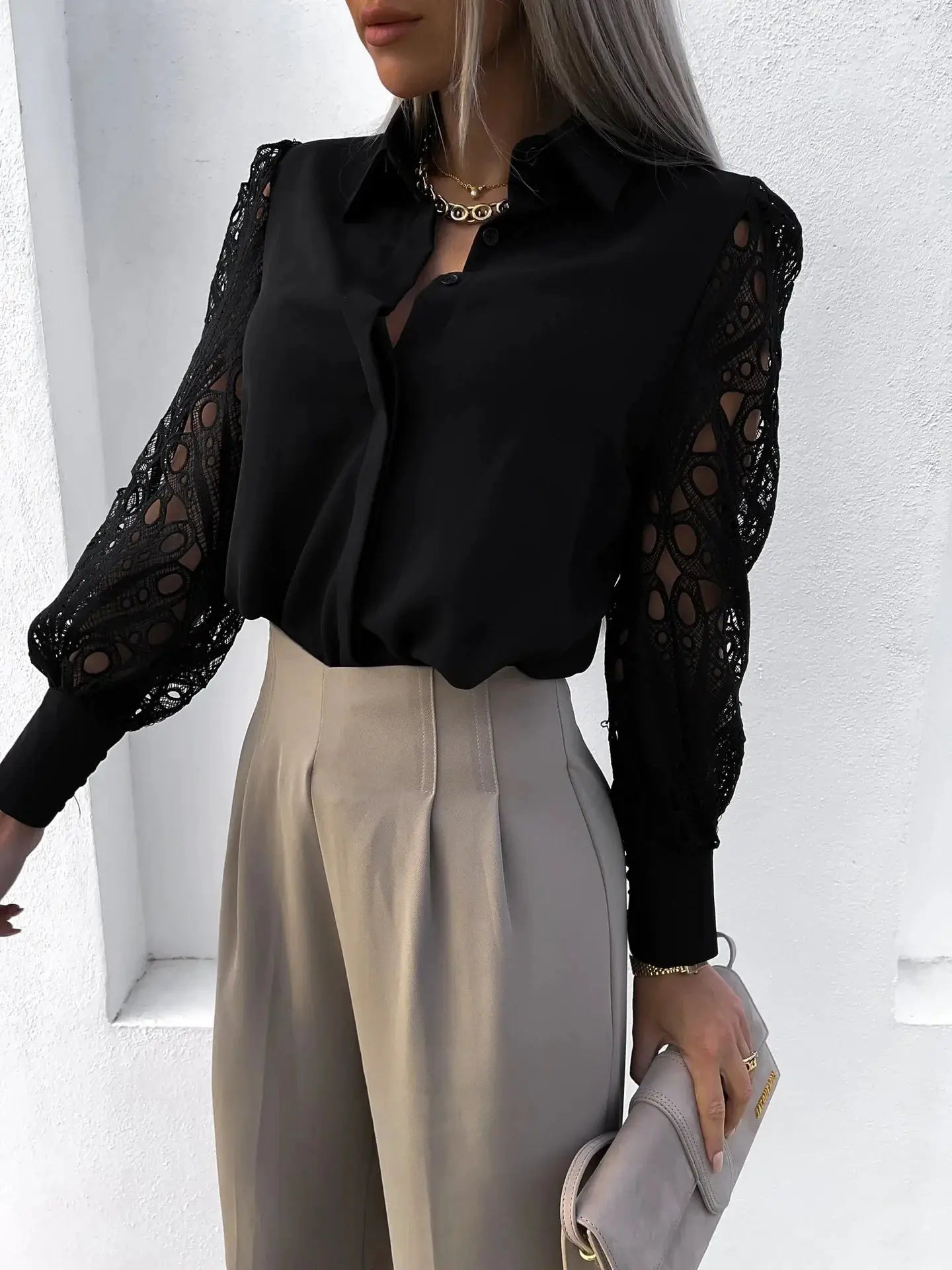 Women’s black chiffon blouse with lace sleeves and a V-neck, office-ready top.