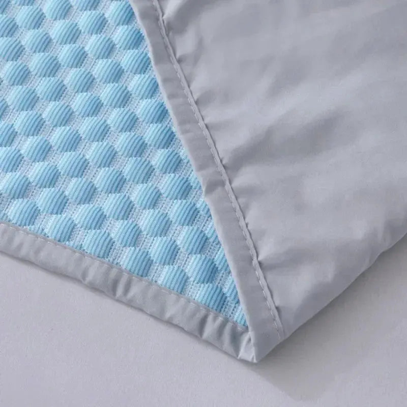 Summer cooling pillowcase by Simples Market, gray outer fabric with blue patterned cooling interior, 48x70cm