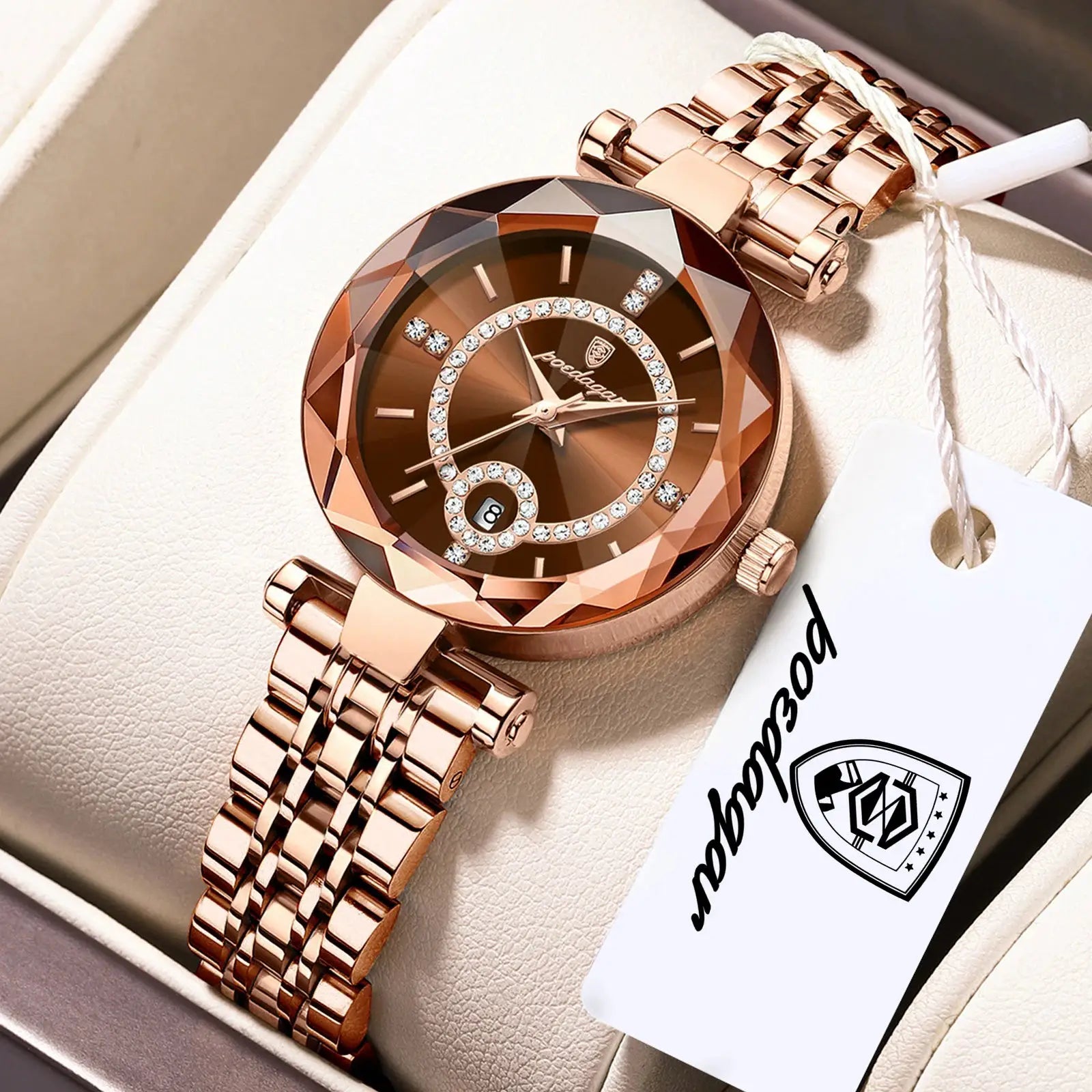 POEDAGAR rose gold women's wristwatch with crystal-studded bezel, stainless steel band and date display