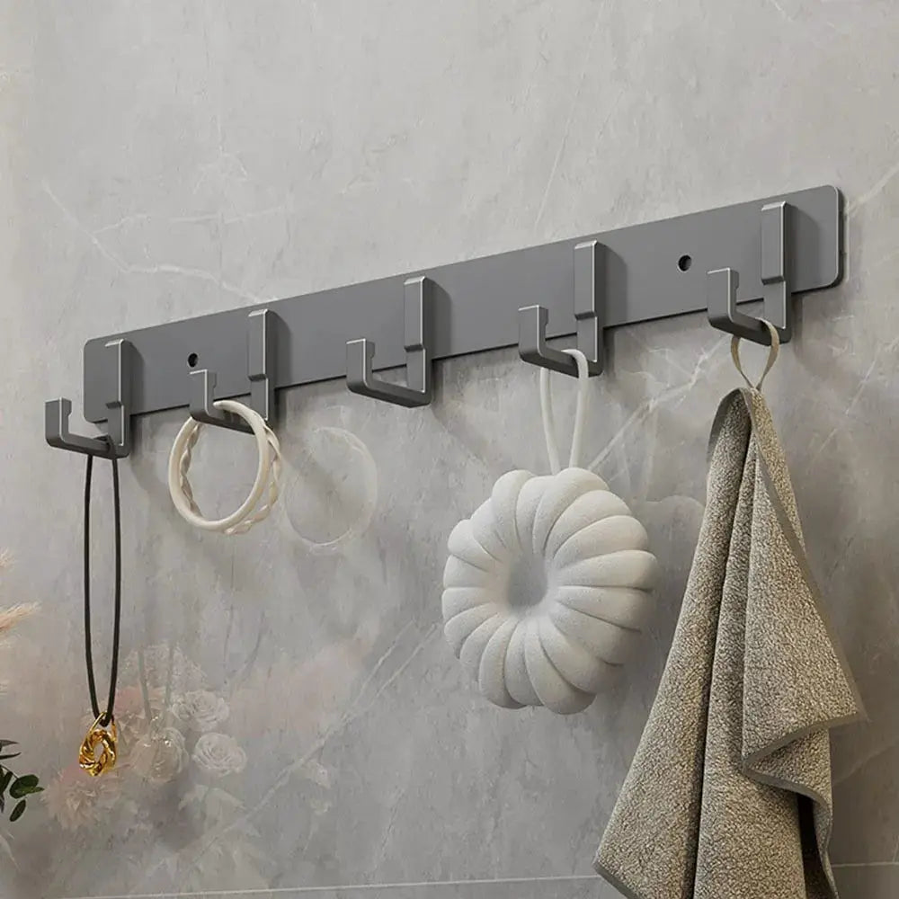 Punch-free aluminum wall hook rack with six gray hooks for kitchen or bathroom organization