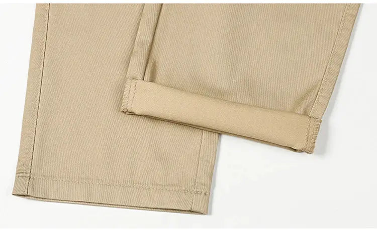 Beige men's business casual straight-leg pants with stretch fabric and cuffed hem