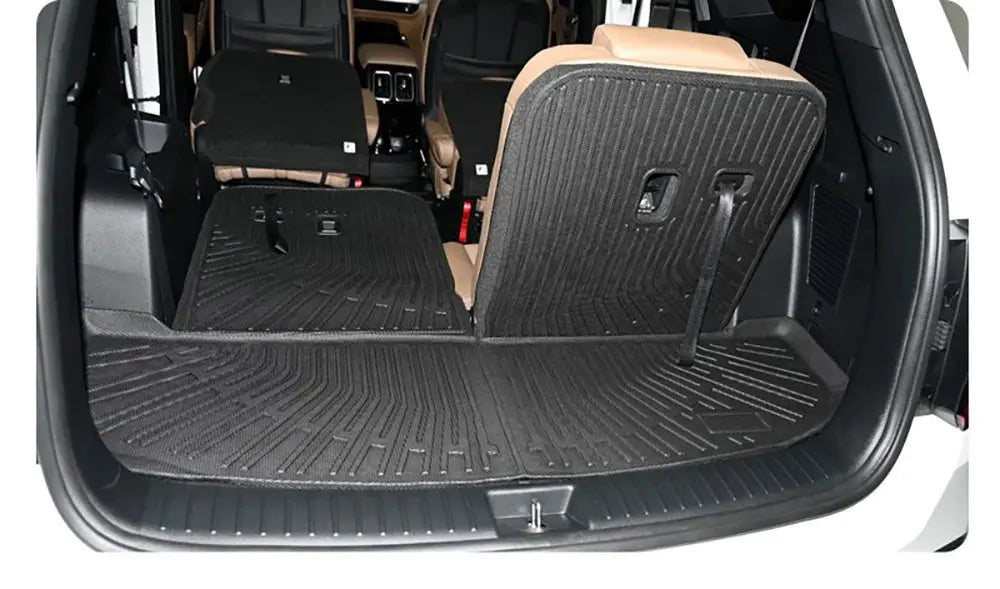 All-weather cargo liner for Kia Sorento trunk in black TPE, covers floor with folded rear seats